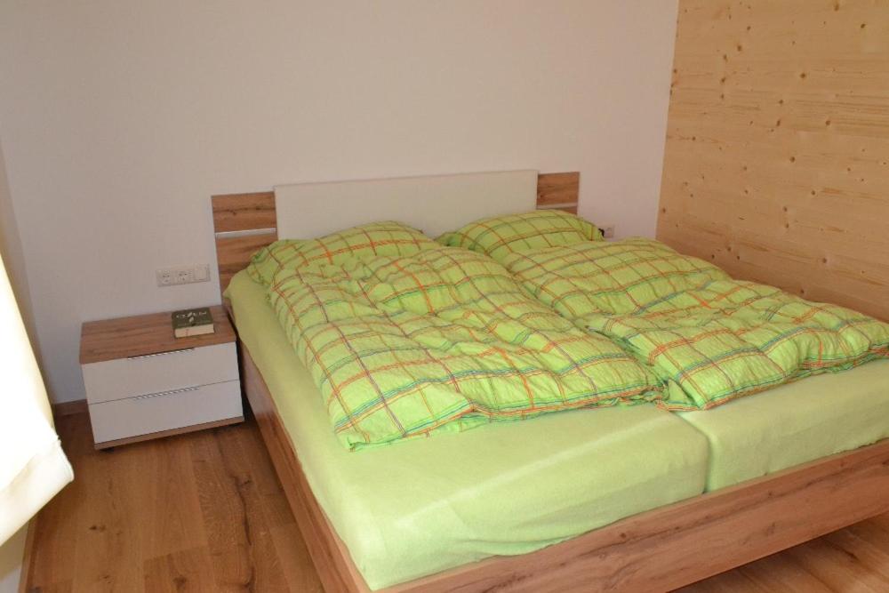 Postel nebo postele na pokoji v ubytování Talhütte App.2