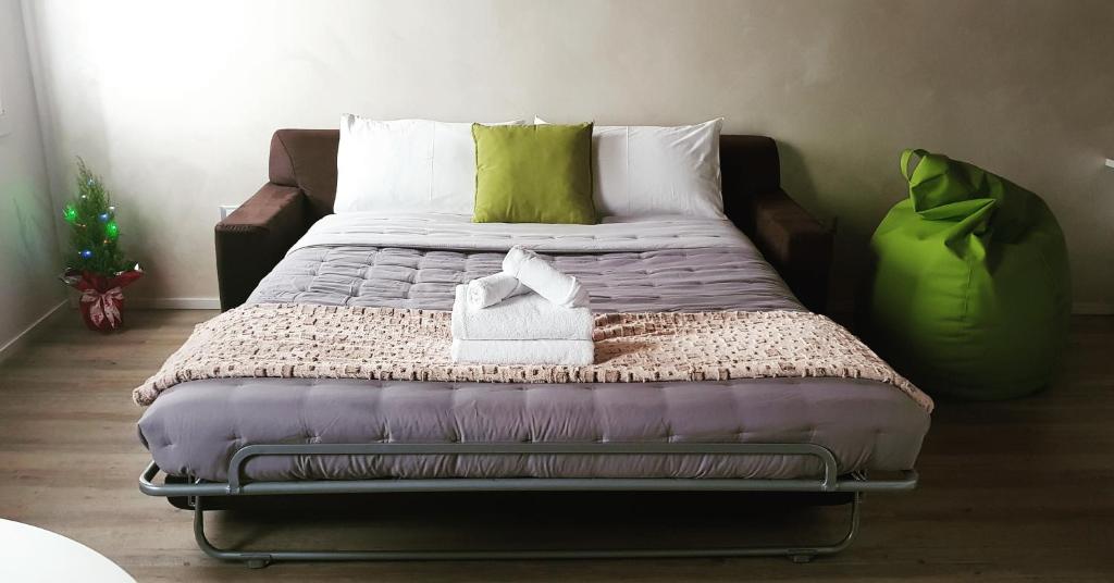 A bed or beds in a room at Ca' dell'Angelo