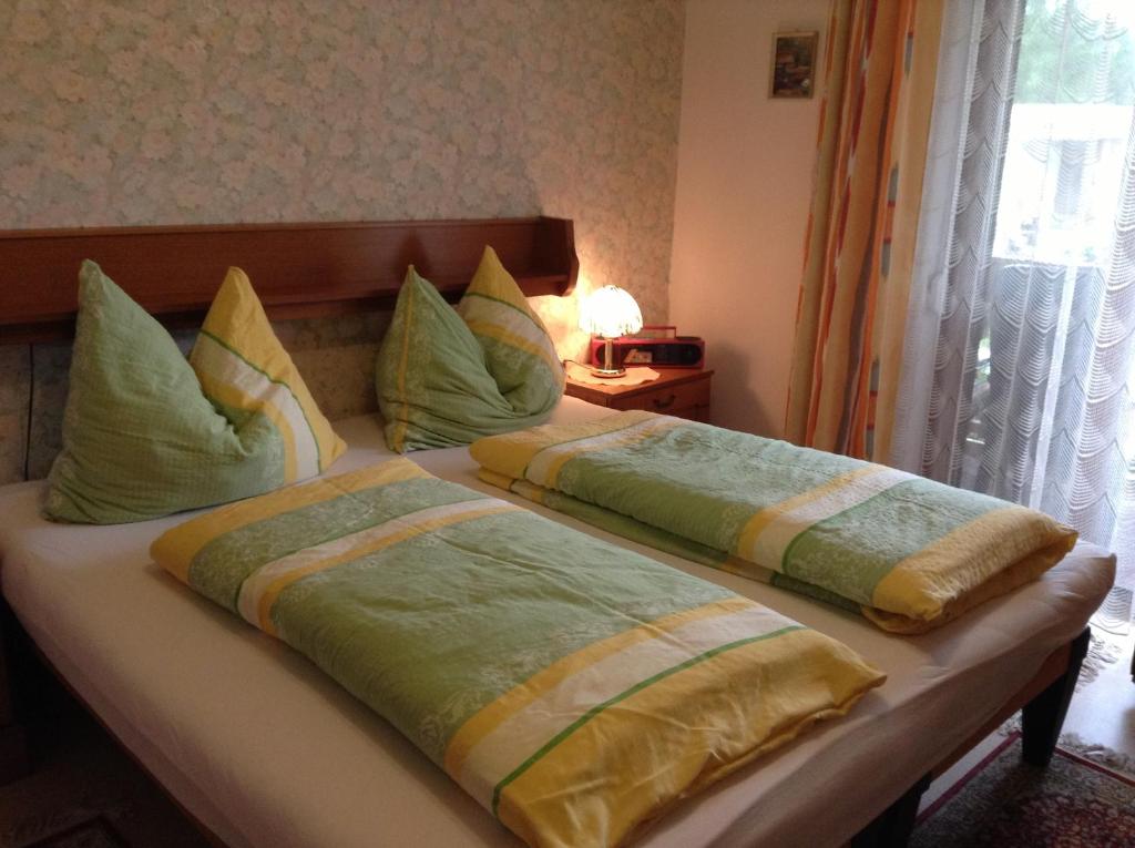 Postel nebo postele na pokoji v ubytování Gästehaus Renate