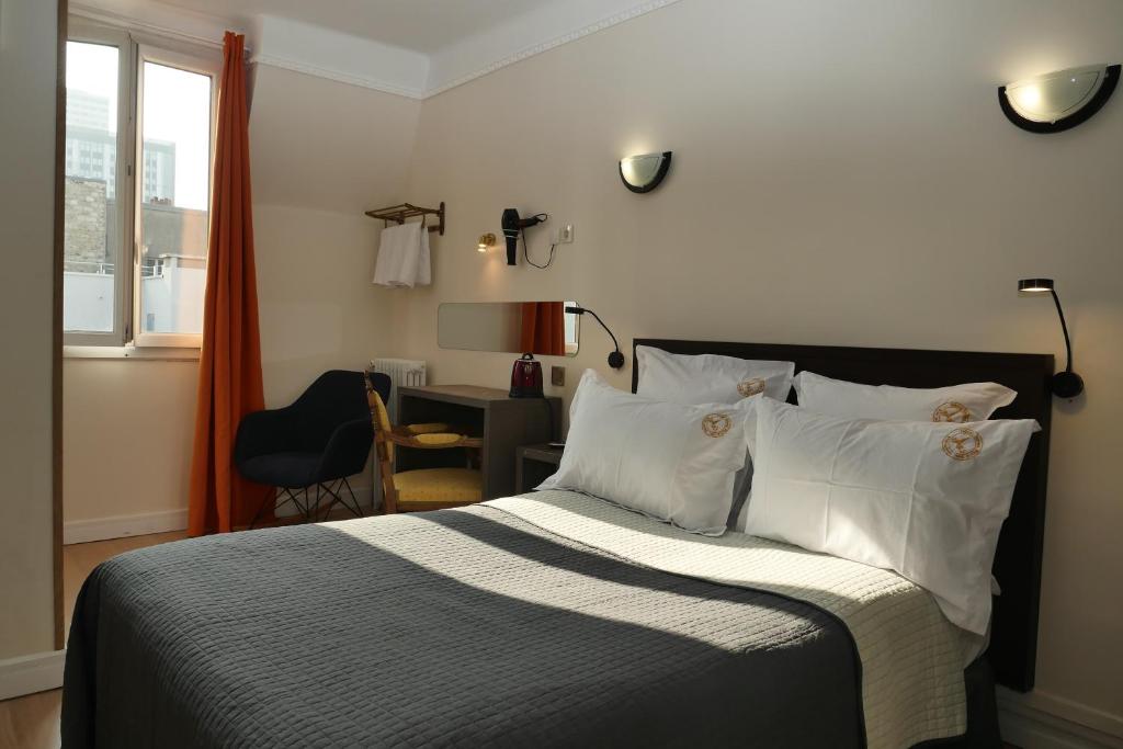 Krevet ili kreveti u jedinici u objektu Hotel Novex Paris