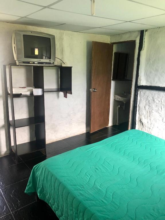 Kuchyň nebo kuchyňský kout v ubytování Finca Hotel Paraiso Urrao