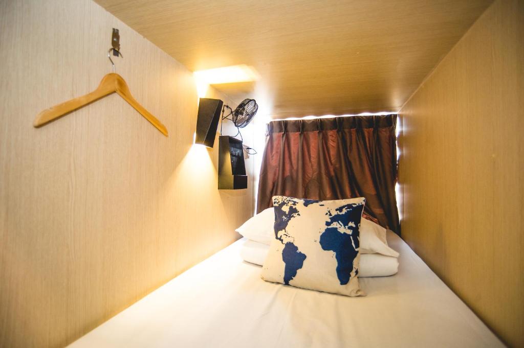 Postel nebo postele na pokoji v ubytování Traveller Bunker Hostel