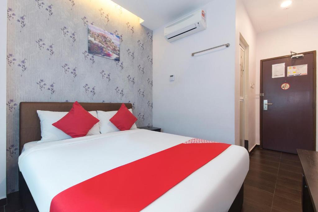 Postel nebo postele na pokoji v ubytování Palazzo Hotel Kulai