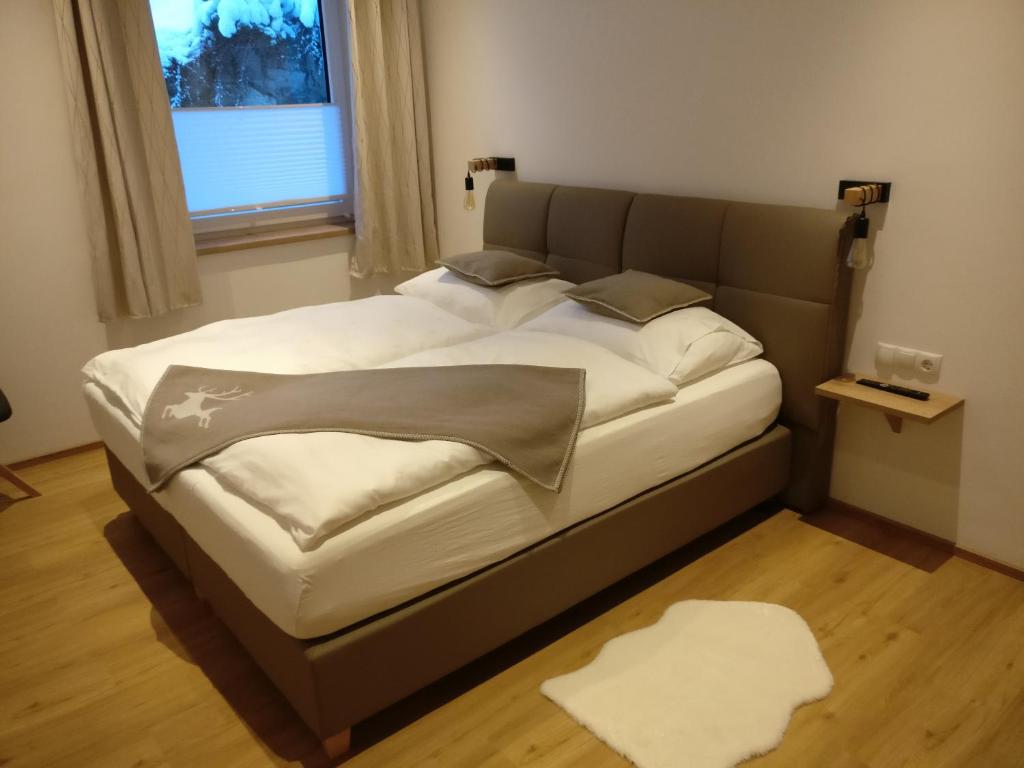 Posteľ alebo postele v izbe v ubytovaní Panorama Appartements Filzerhof