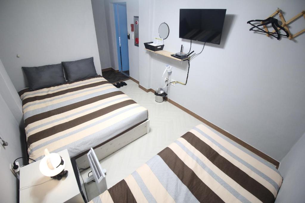 TV a/nebo společenská místnost v ubytování 24Guesthouse Seomyeon
