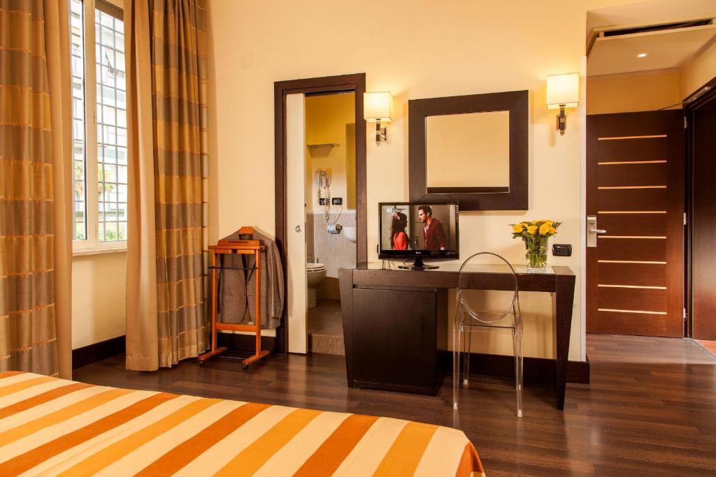 Postel nebo postele na pokoji v ubytování Hotel Buenos Aires