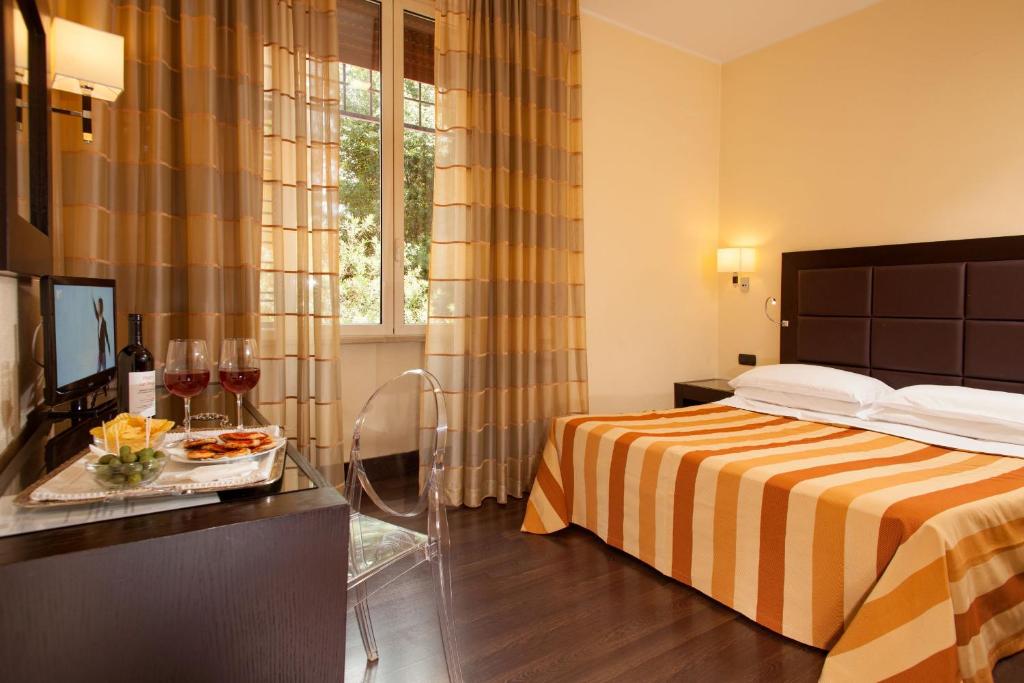 Postel nebo postele na pokoji v ubytování Hotel Buenos Aires