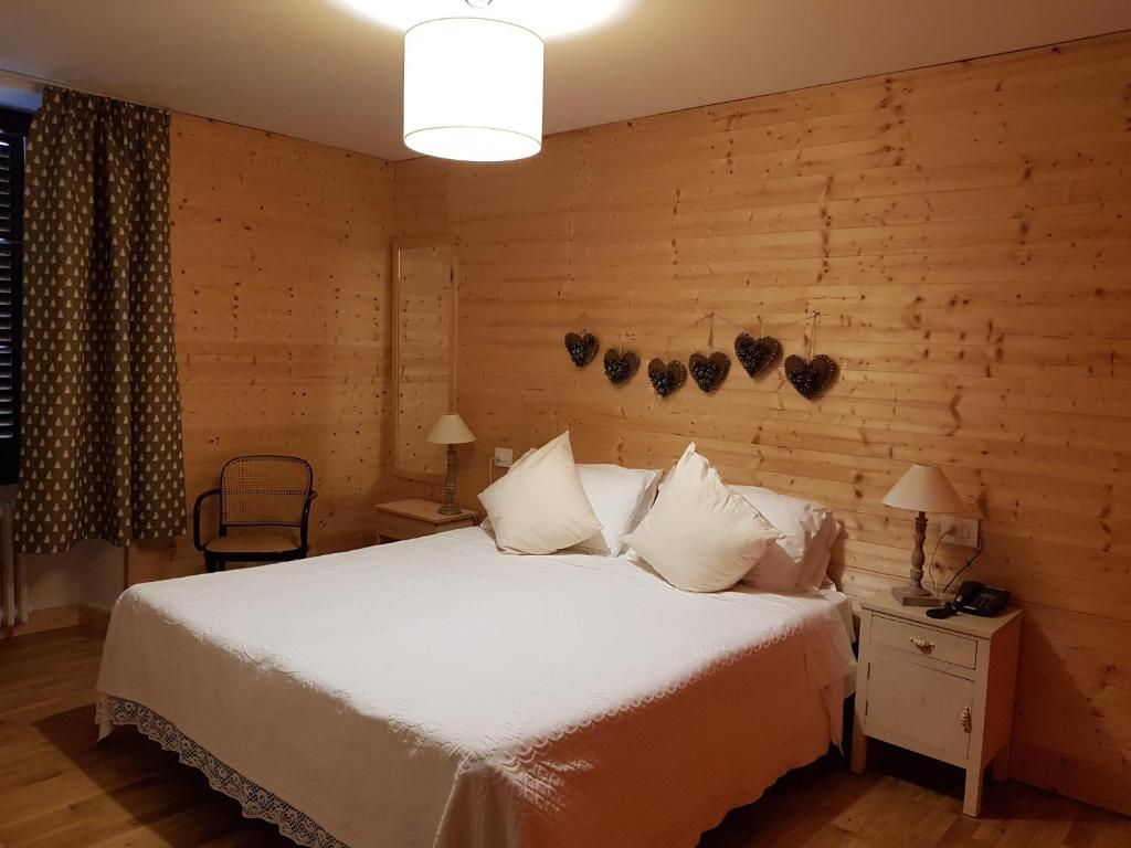 Postel nebo postele na pokoji v ubytování Hotel Pedretti