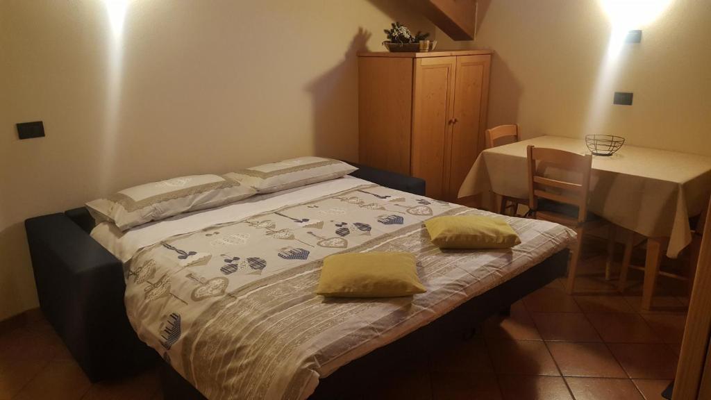 Postel nebo postele na pokoji v ubytování Casa Le Rondini