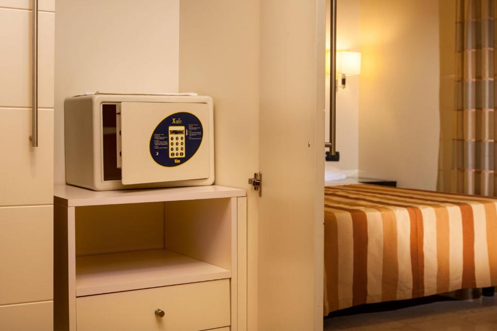 Postel nebo postele na pokoji v ubytování Hotel Buenos Aires
