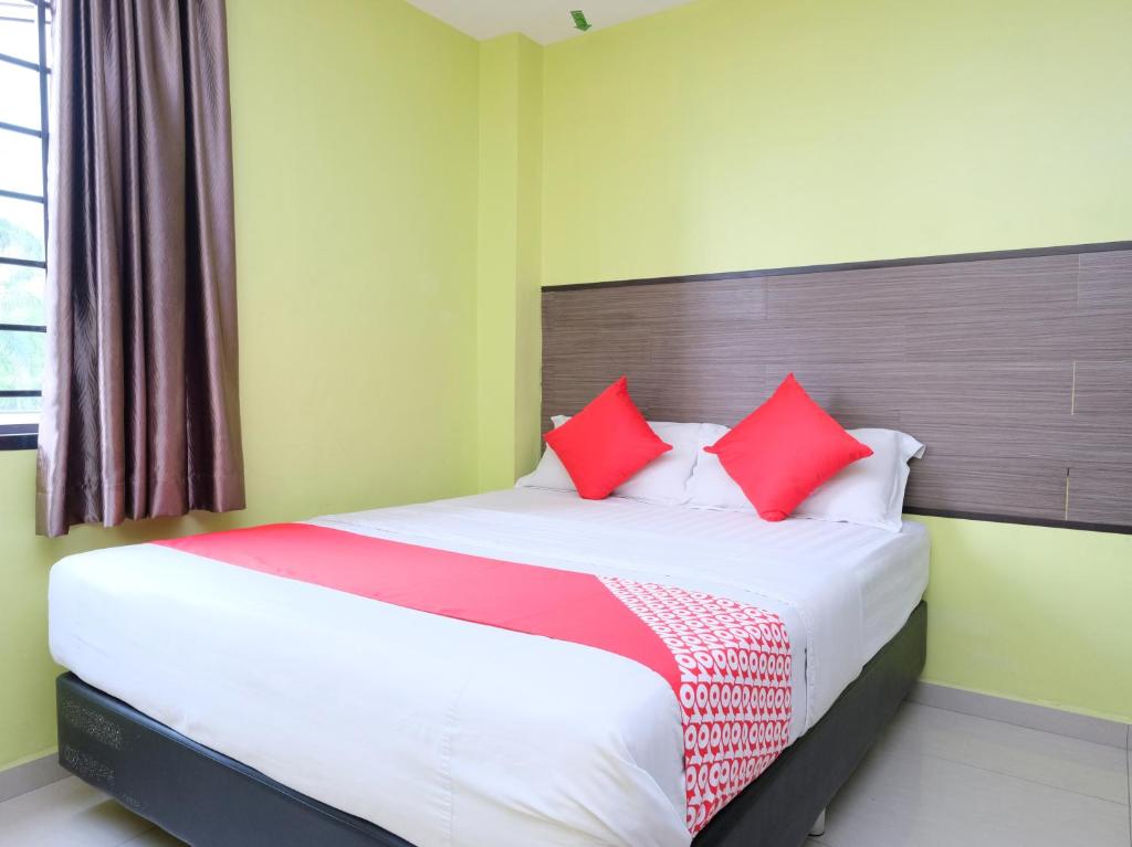 Postel nebo postele na pokoji v ubytování Hotel De' Tees, Masai Utama