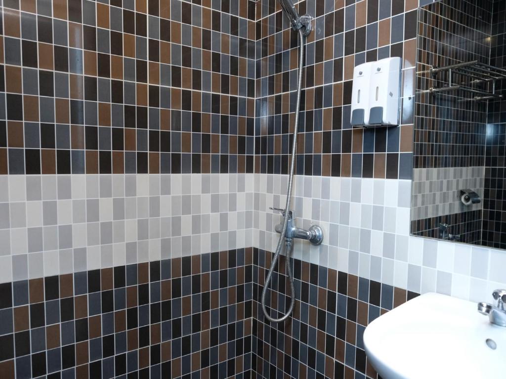 Koupelna v ubytování Hotel De' Tees, Masai Utama