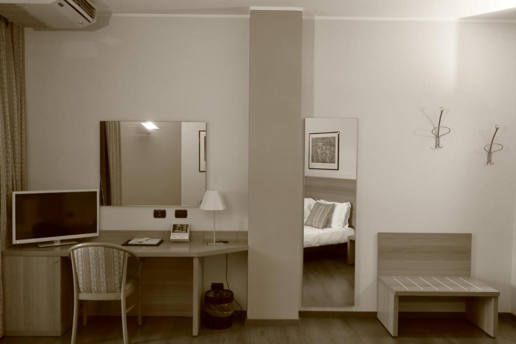 TV a/nebo společenská místnost v ubytování Hotel Romanisio