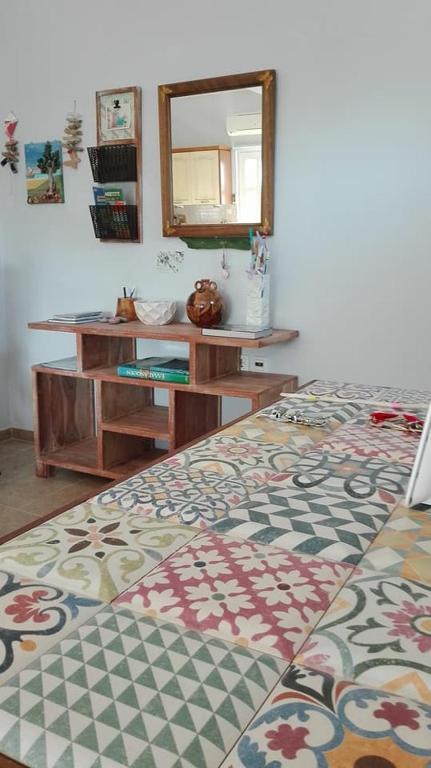 A bed or beds in a room at Dimitris' & Valentina's Home