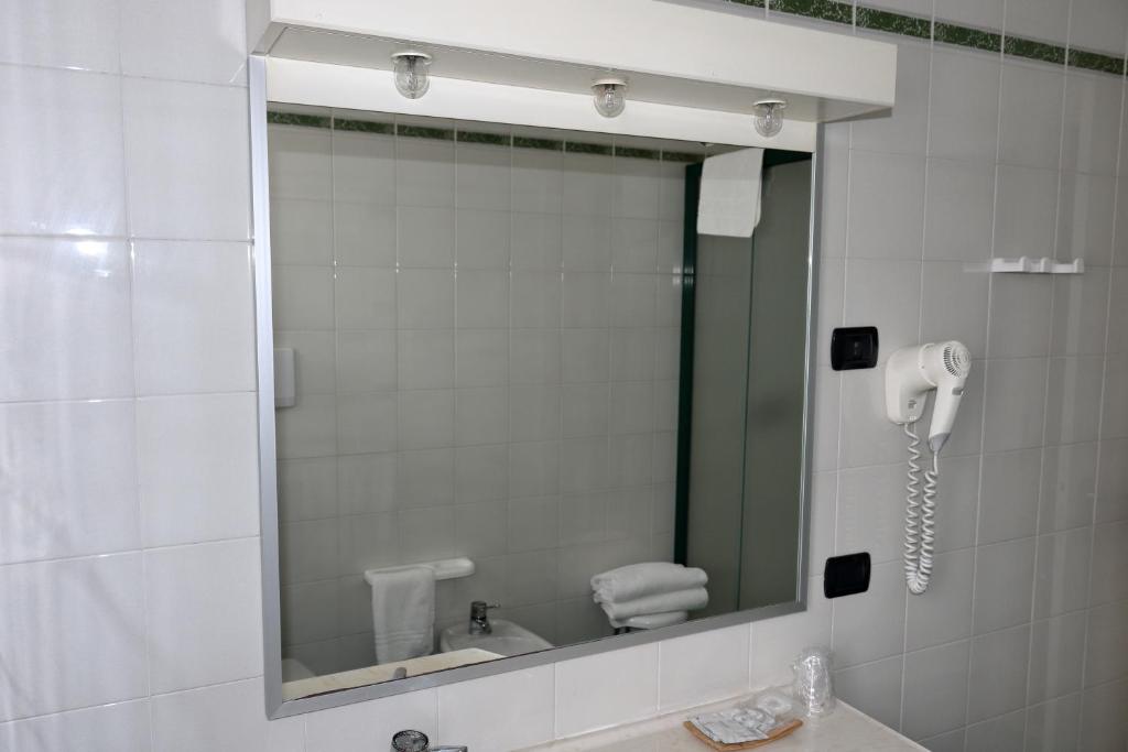 Koupelna v ubytování Hotel Romanisio