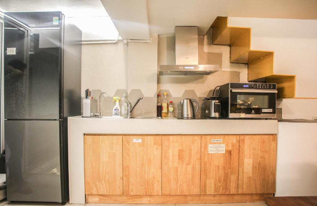 Kuchyň nebo kuchyňský kout v ubytování Hanoi Banana Hostel