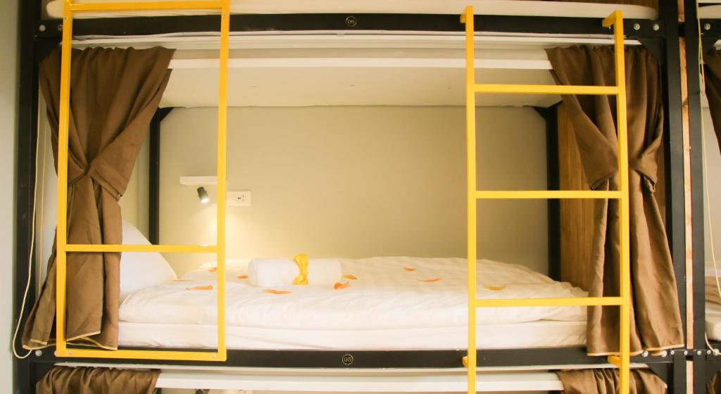 Postel nebo postele na pokoji v ubytování Hanoi Banana Hostel
