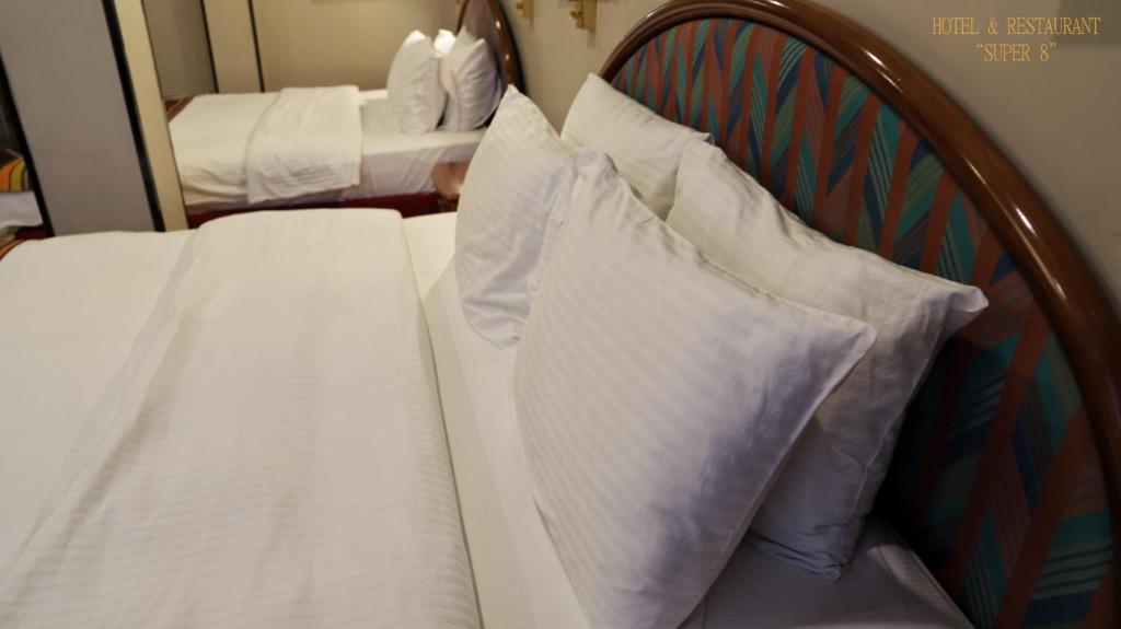 Postel nebo postele na pokoji v ubytování Hotel Super 8
