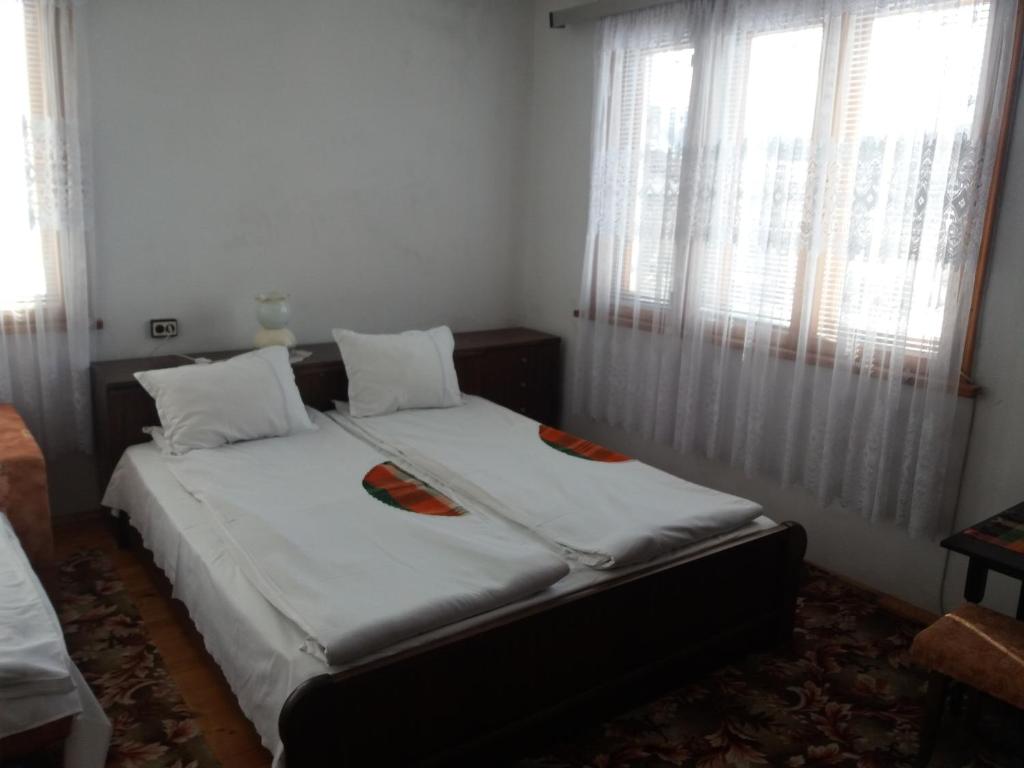 Postel nebo postele na pokoji v ubytování Guest House AHP