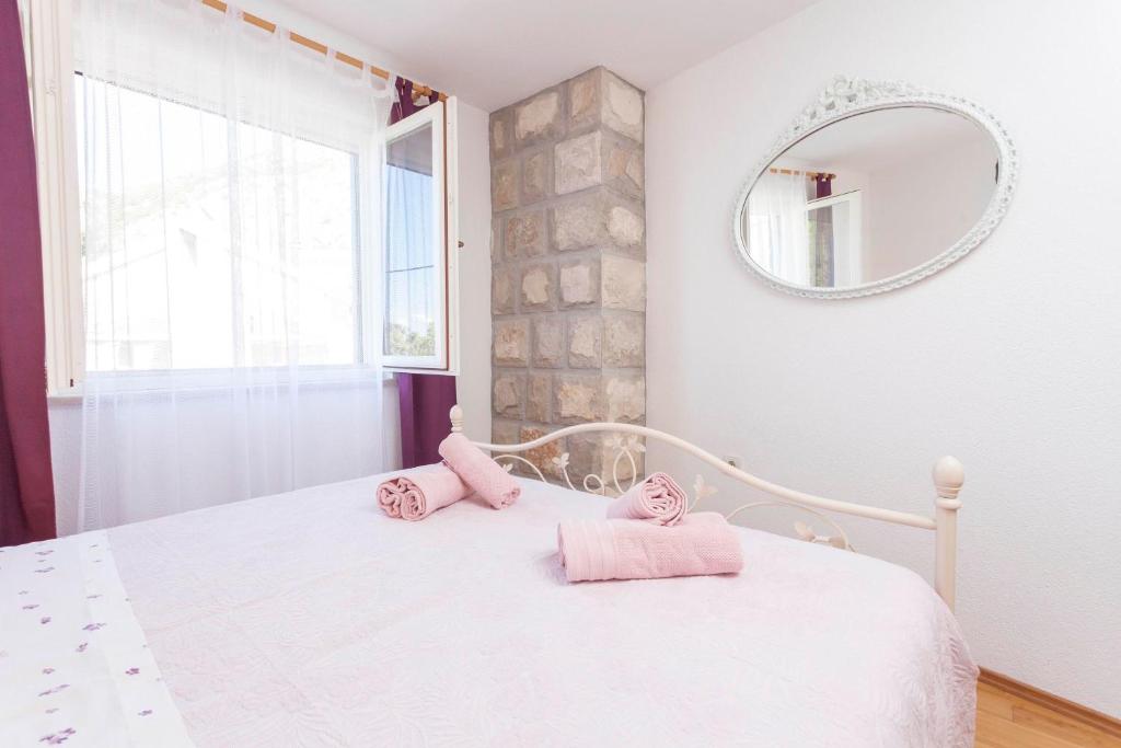 Posteľ alebo postele v izbe v ubytovaní Holiday home Lavanda Grubisic Tucepi