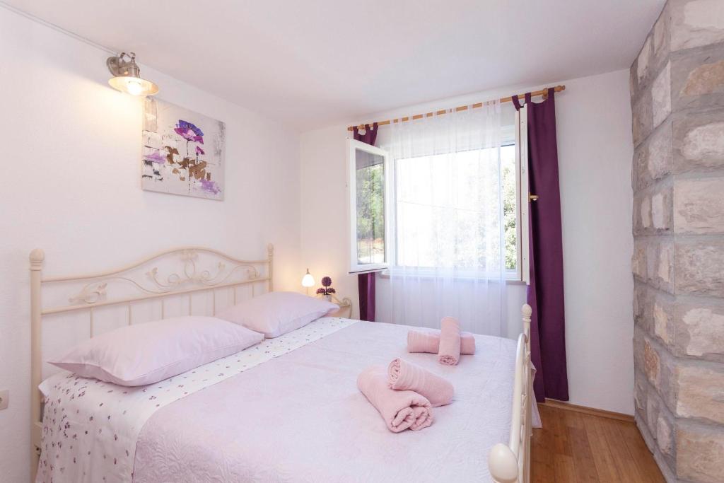 Posteľ alebo postele v izbe v ubytovaní Holiday home Lavanda Grubisic Tucepi