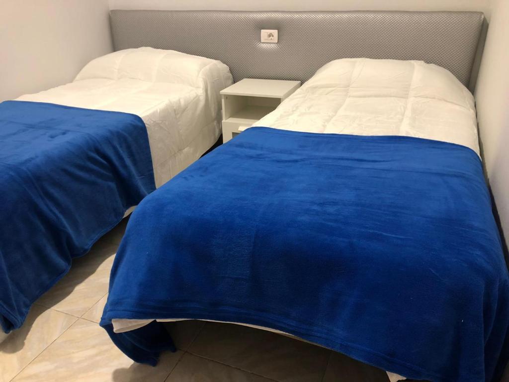 En eller flere senge i et værelse på FANTÁSTICO APTO. 6 pax, TABLERO 5, cerca PLAYA INGLÉS