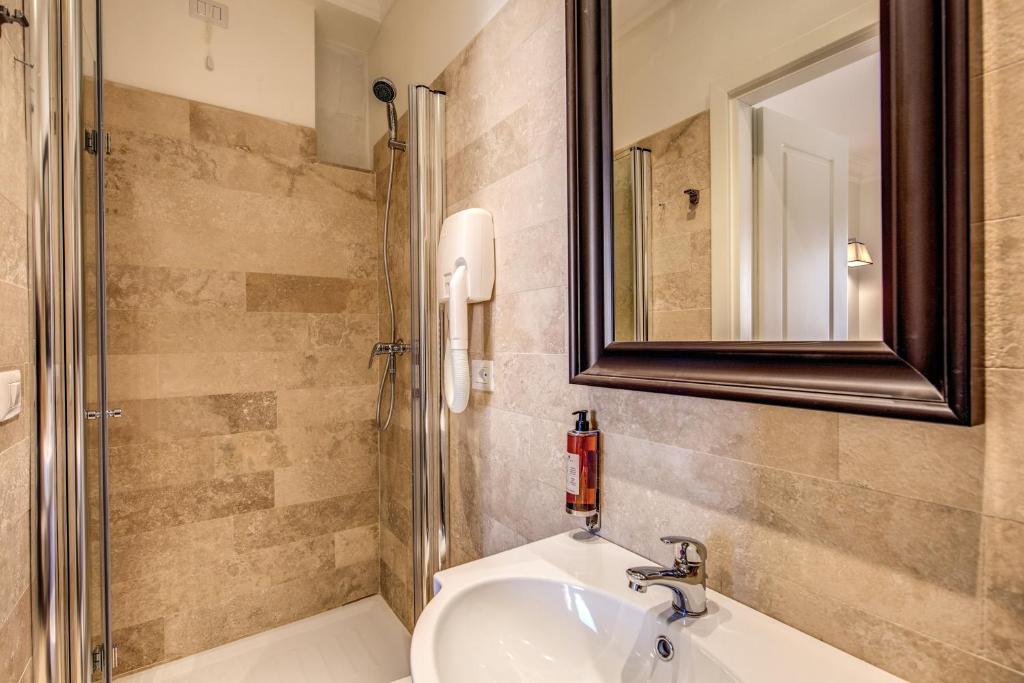 Koupelna v ubytování Hotel Domus Mea