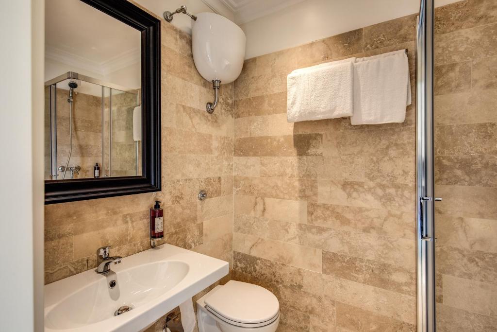 Koupelna v ubytování Hotel Domus Mea