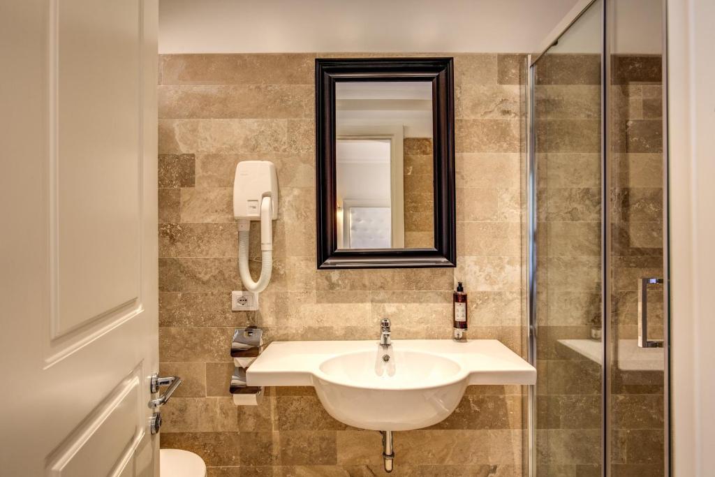 Koupelna v ubytování Hotel Domus Mea