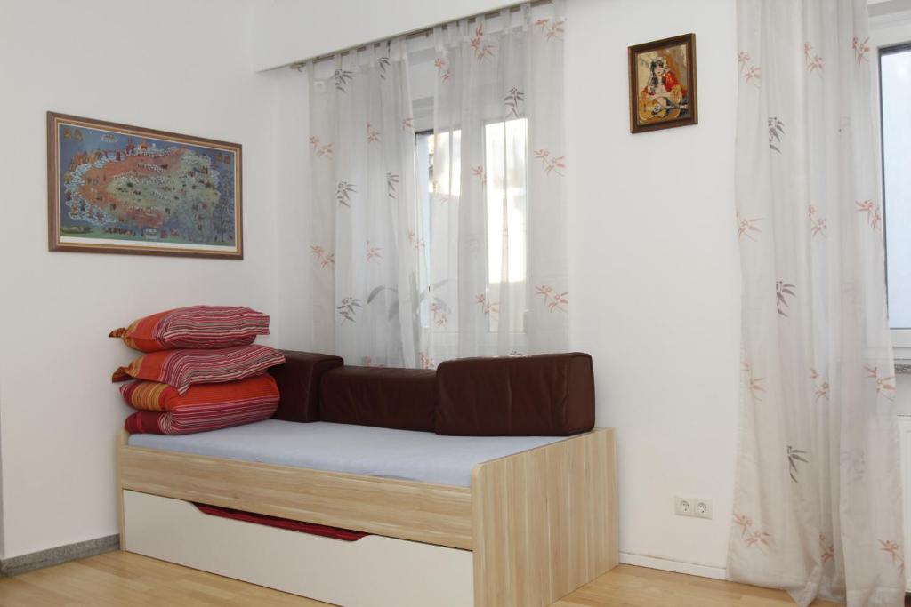 Postel nebo postele na pokoji v ubytování Stay-In Vienna 23