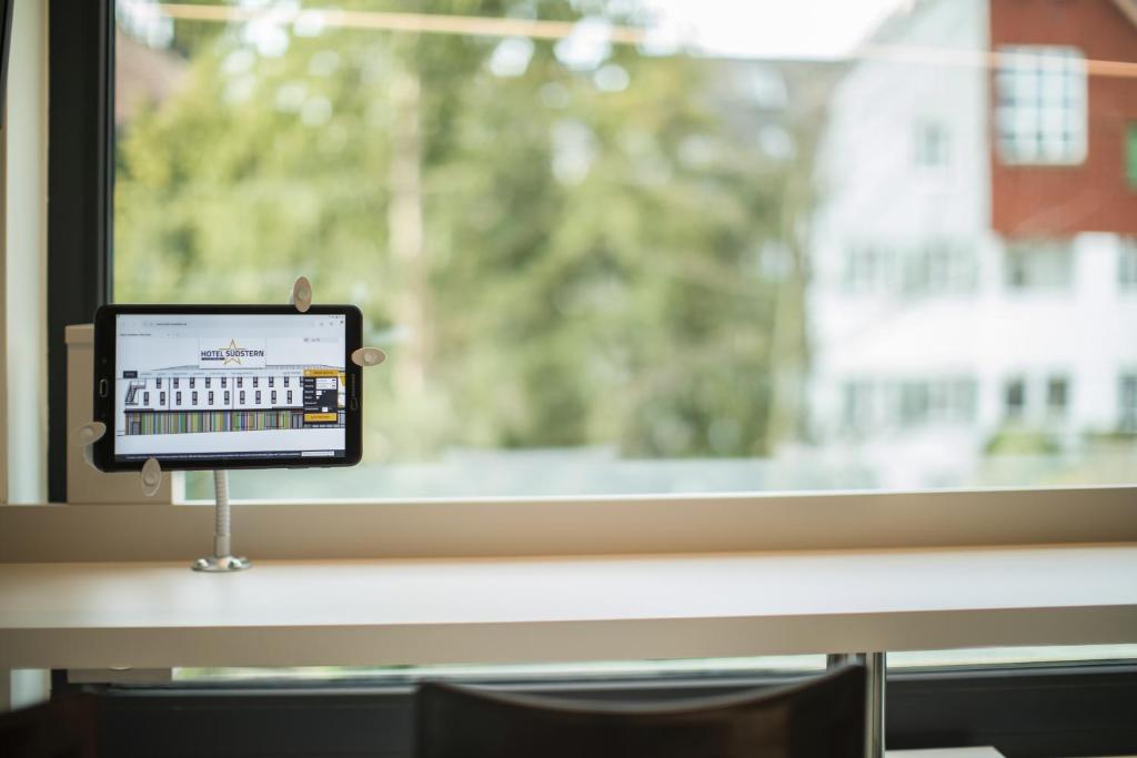 TV a/nebo společenská místnost v ubytování Hotel Südstern