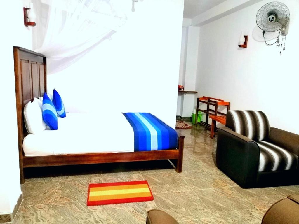 Postel nebo postele na pokoji v ubytování Ella Infinity View