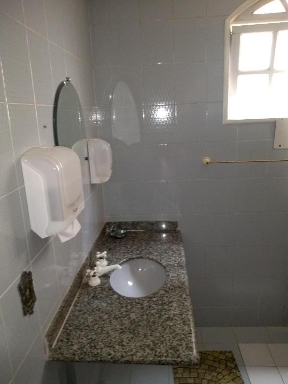 Koupelna v ubytování Onça da Praia Hostel
