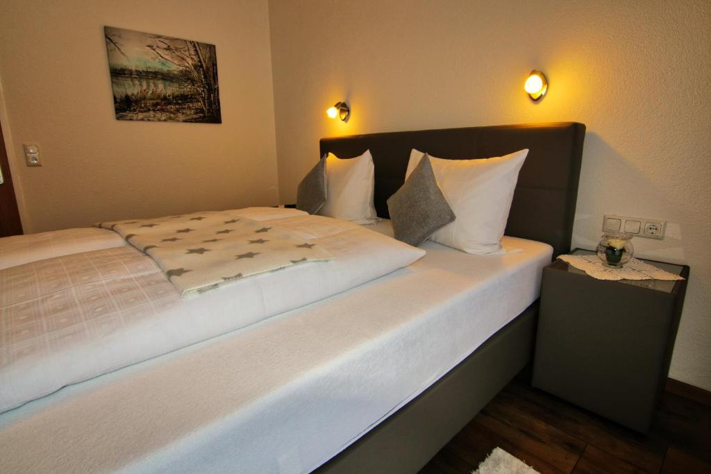 Postel nebo postele na pokoji v ubytování Haus Scheiber