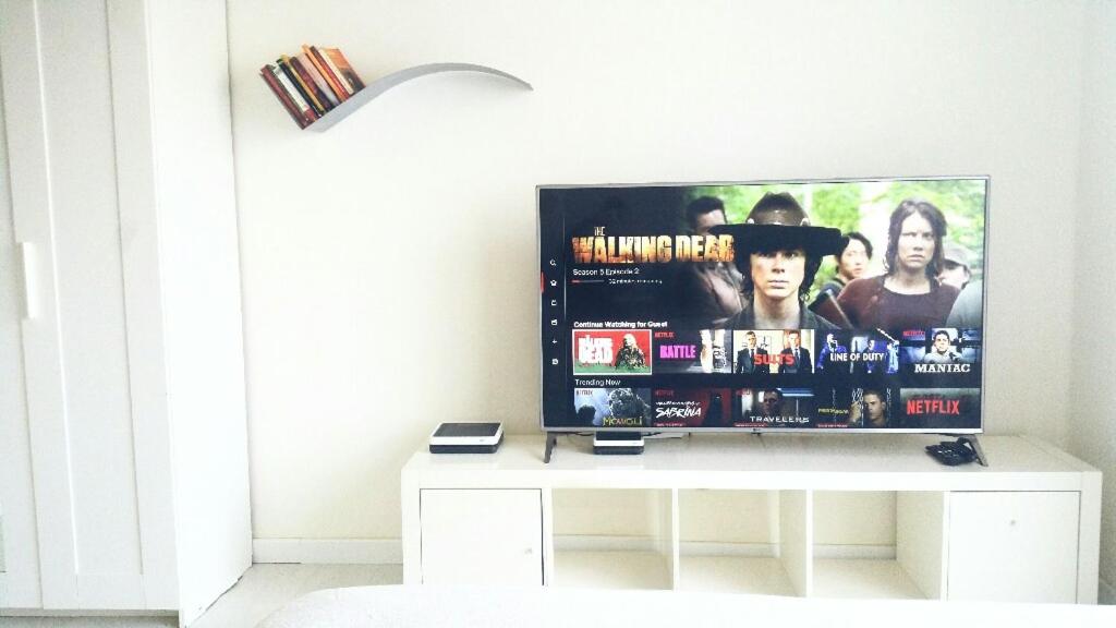 TV a/nebo společenská místnost v ubytování Le Suite Studio 491