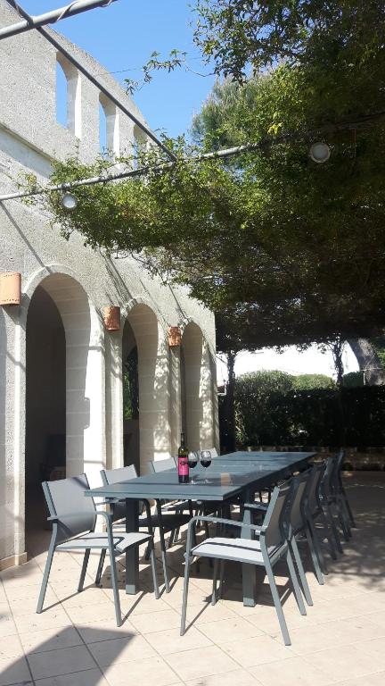 Patio nebo venkovní prostory v ubytování Villa I Tamarigi