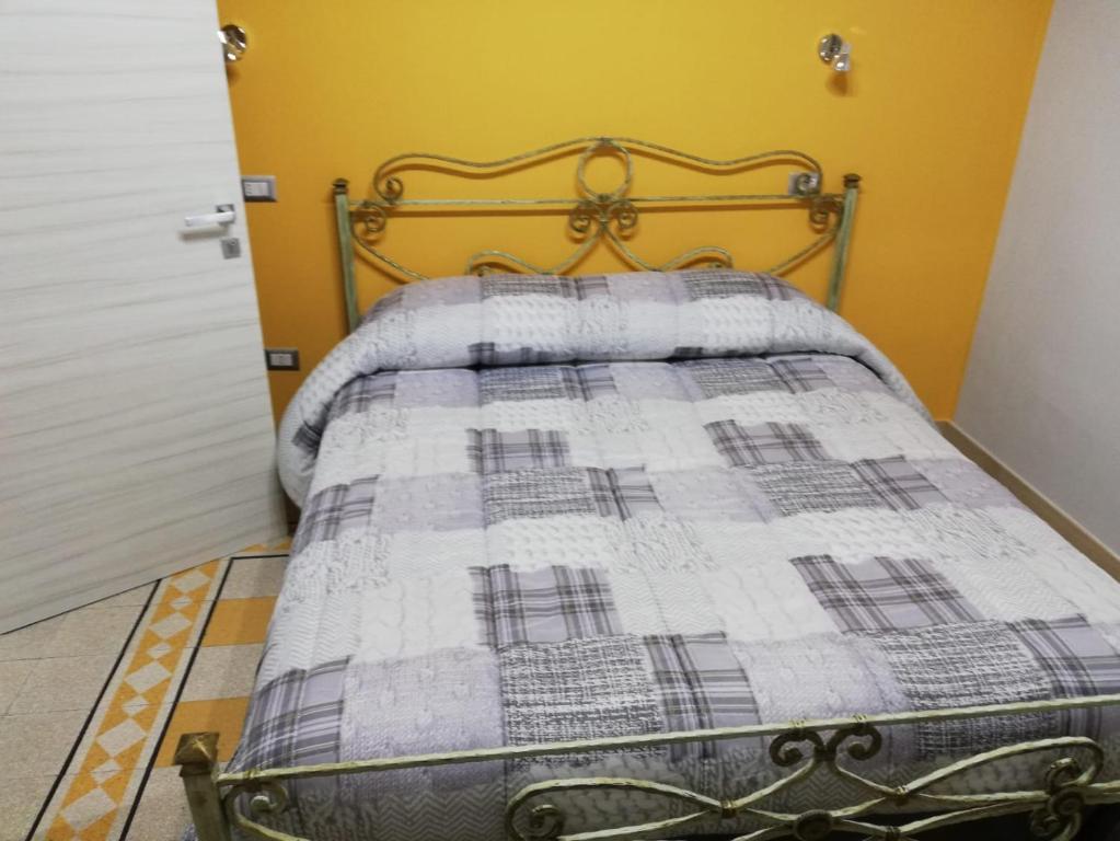 Postel nebo postele na pokoji v ubytování B&B Enjoy Ercolano