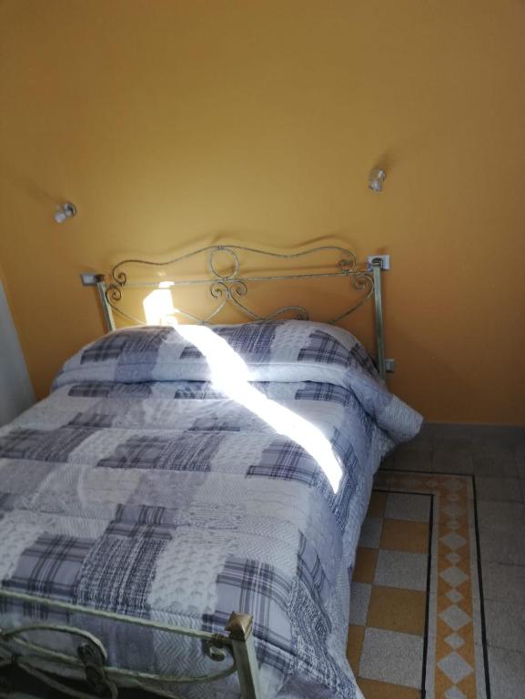 Postel nebo postele na pokoji v ubytování B&B Enjoy Ercolano