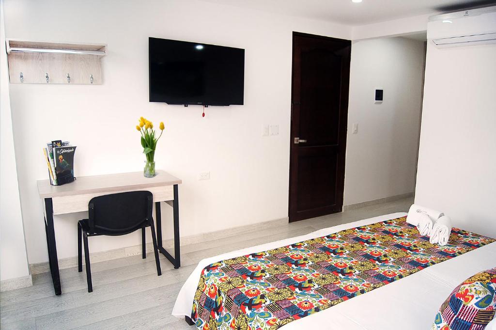Postel nebo postele na pokoji v ubytování Hotel Cafeira