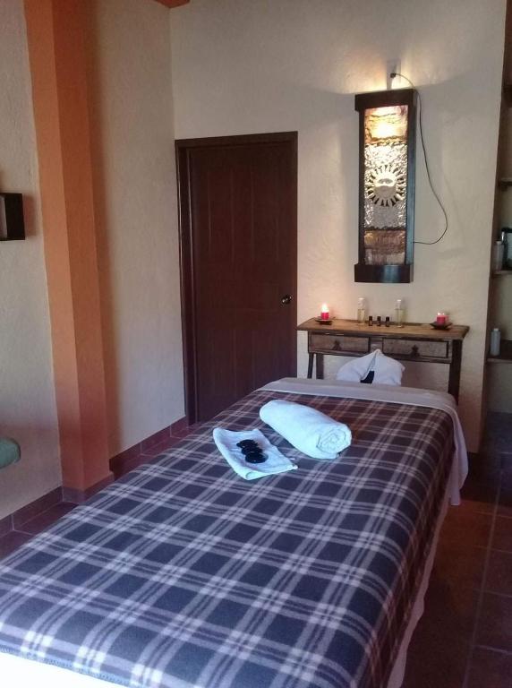 Postel nebo postele na pokoji v ubytování Posada Rincon Magico