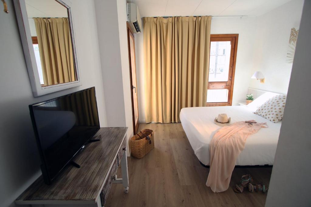 TV a/nebo společenská místnost v ubytování Hotel Mireia