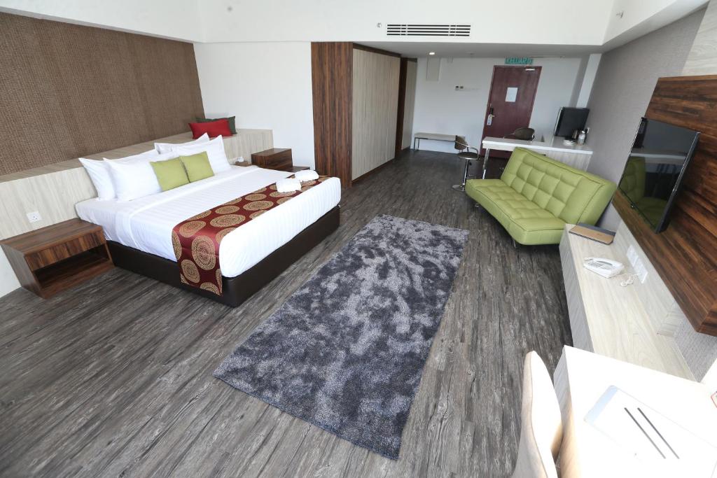 Postel nebo postele na pokoji v ubytování AMERALD RESORT HOTEL DESARU