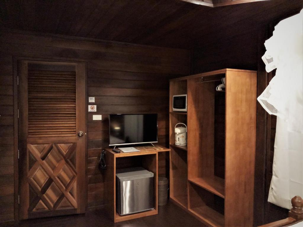 Kuchyň nebo kuchyňský kout v ubytování Cozy Garden Resort