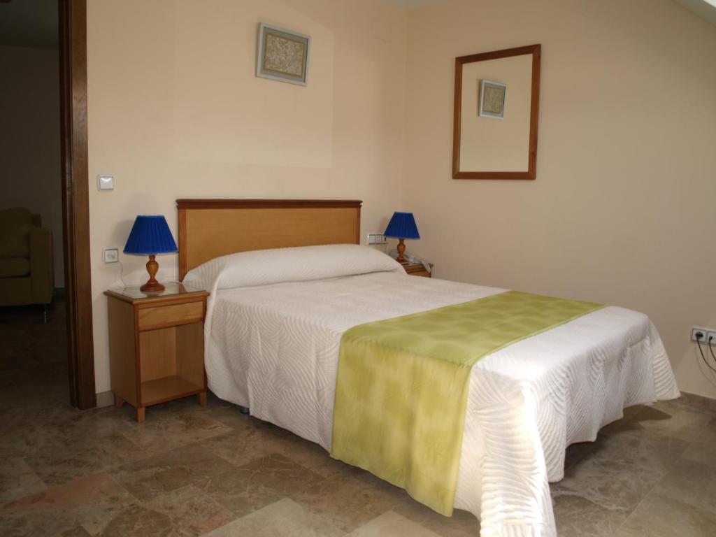 Postel nebo postele na pokoji v ubytování Hotel Al-Yussana