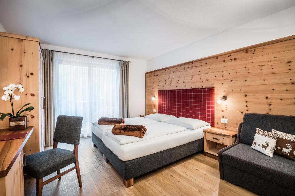 Postel nebo postele na pokoji v ubytování Hotel Alcialc