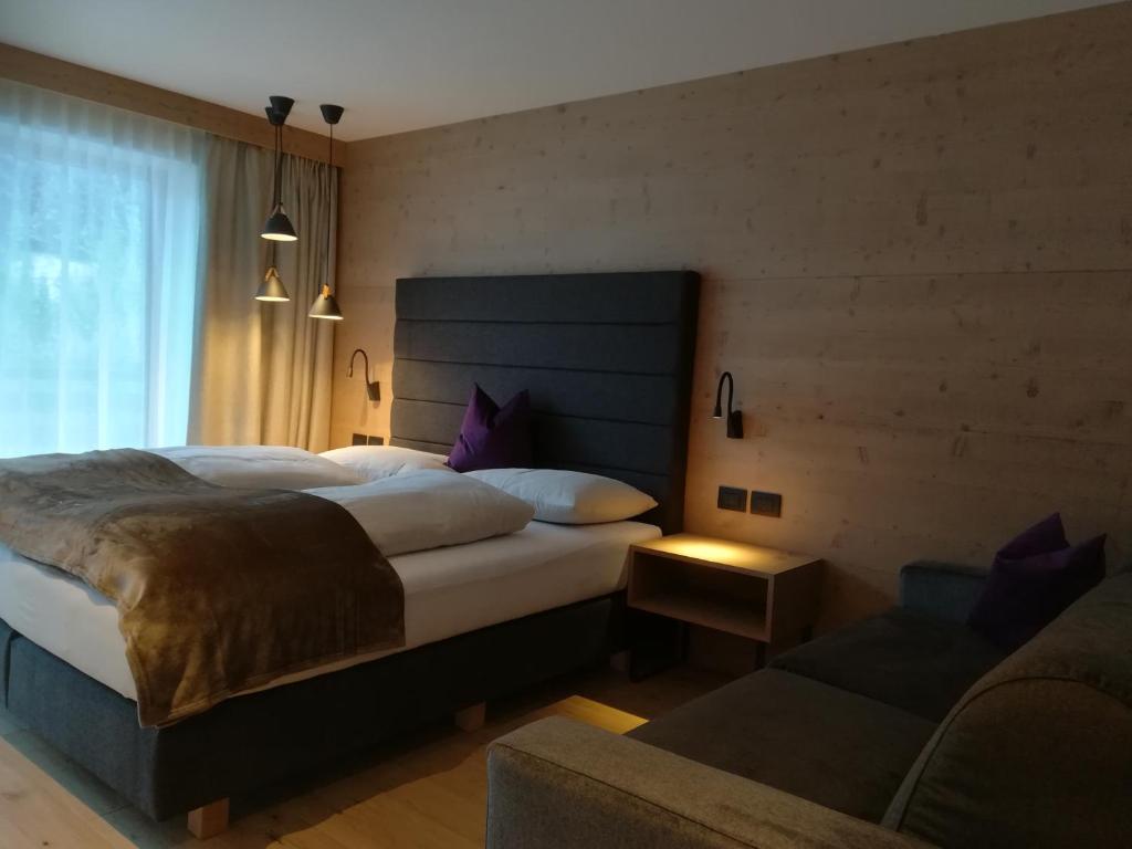 Postel nebo postele na pokoji v ubytování Hotel Alcialc