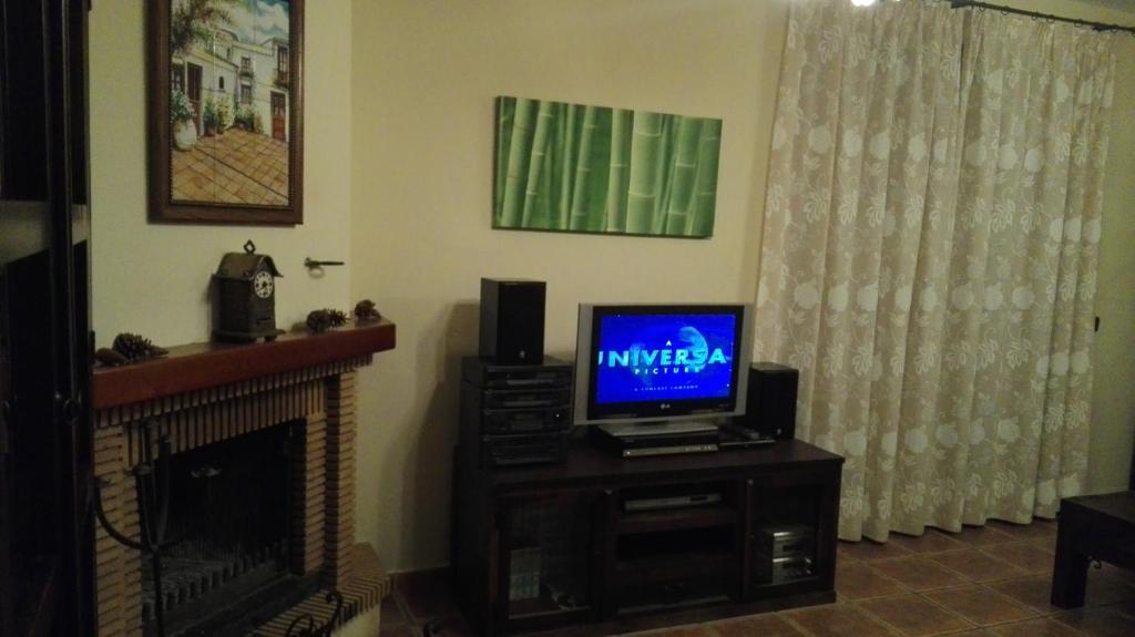 TV a/nebo společenská místnost v ubytování Cortijo Rural Los Gonzalez