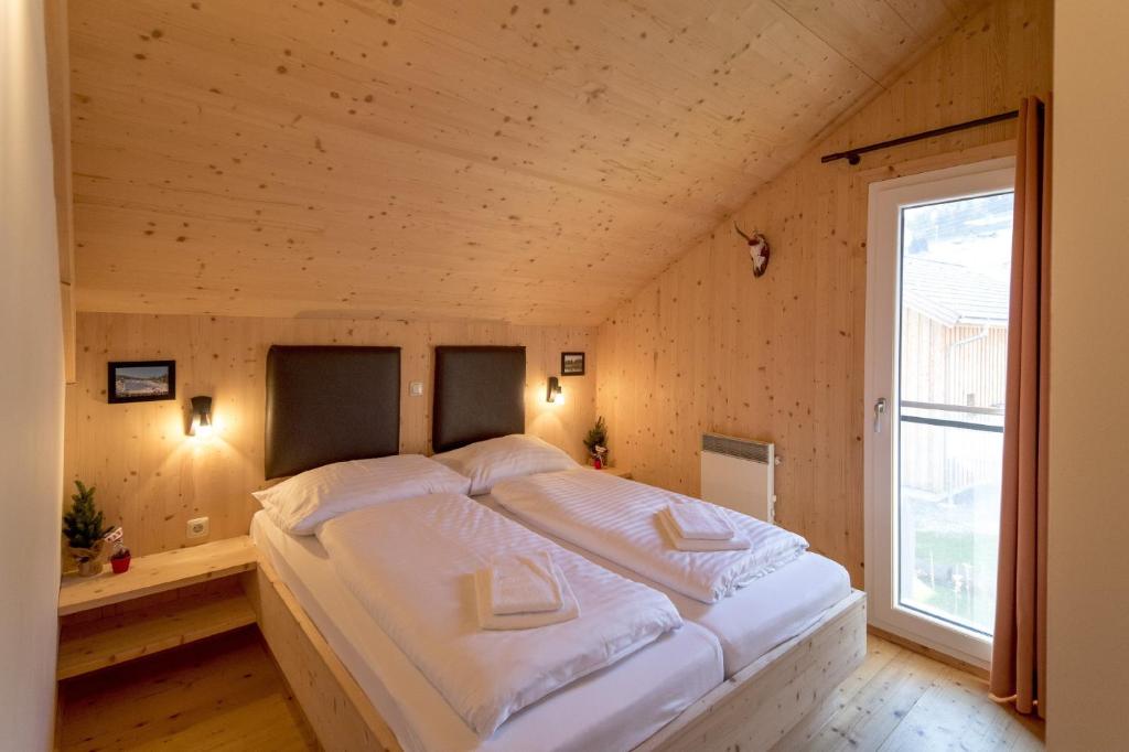 Postel nebo postele na pokoji v ubytování Luxury Chalet Kreischberg 11a