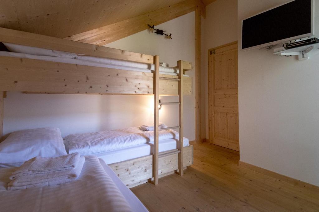 Postel nebo postele na pokoji v ubytování Luxury Chalet Kreischberg 11a
