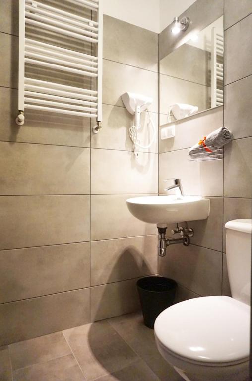 Koupelna v ubytování Expolis Residence - City Center MTP TARGI - 24h #betterthanyourEX